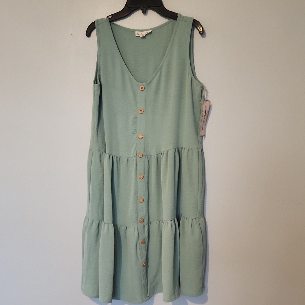 Elegant Sleeveless Mint Dress with Button Detail